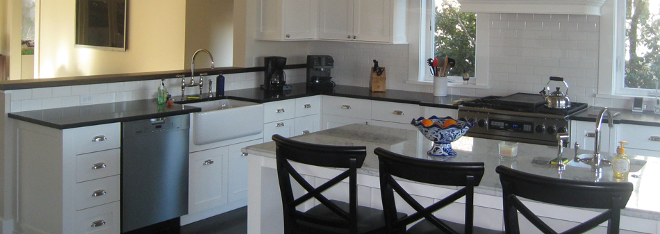 Sleek and chic, an ultra modern kitchen with custom shaped counters and a center island is the perfect combination of form and function.