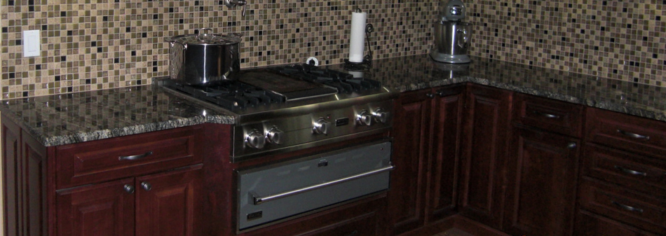 A mosaic tiled backsplash is the perfect companion to a granite countertop, bringing depth and warmth to a traditional kitchen, or a personal touch to a modern design.